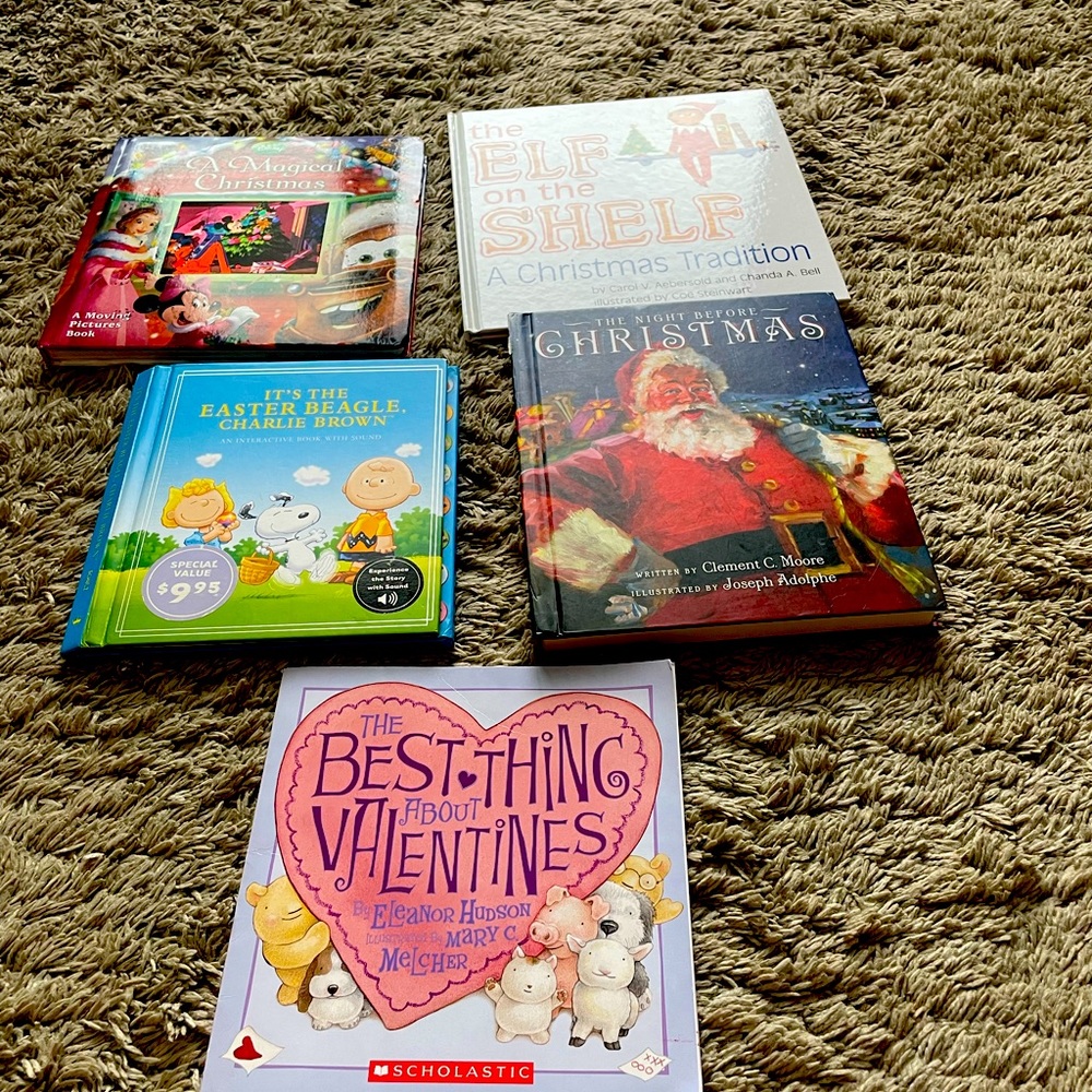 4 hard cover holiday books with pictures and one soft cover